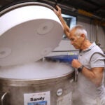 Harvard University professor Alberto Ascherio opens a liquid nitrogen freezer.