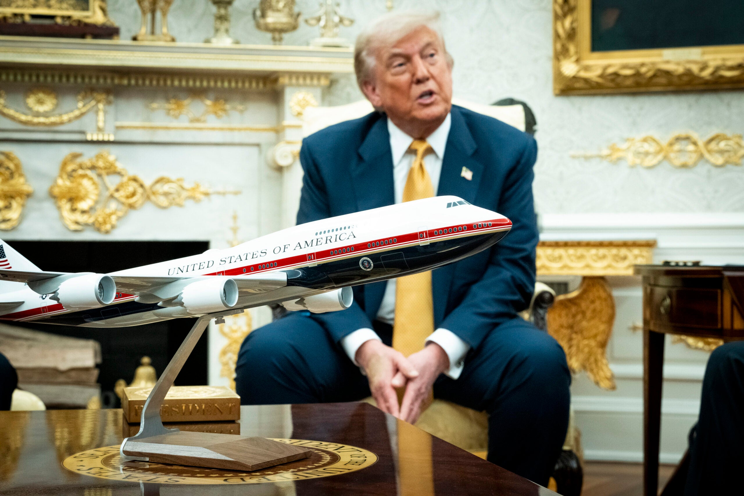 President Donald Trump speaks during a meeting. 